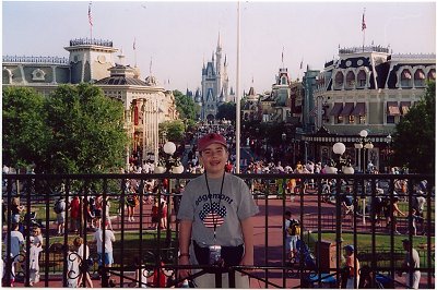 Greg at the entrance to the Magic Kingdom