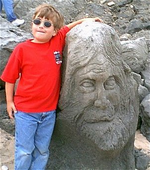 Greg and a bust carved out of clay
